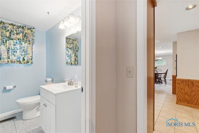 1639 Brookside Dr, Findlay, OH 45840 - bathroom with tile patterned flooring, vanity, and toilet