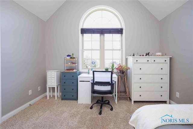 bedroom featuring vaulted ceiling, carpet, and baseboards
