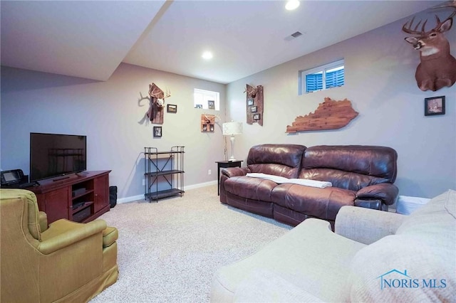 living room with carpet, recessed lighting, and baseboards