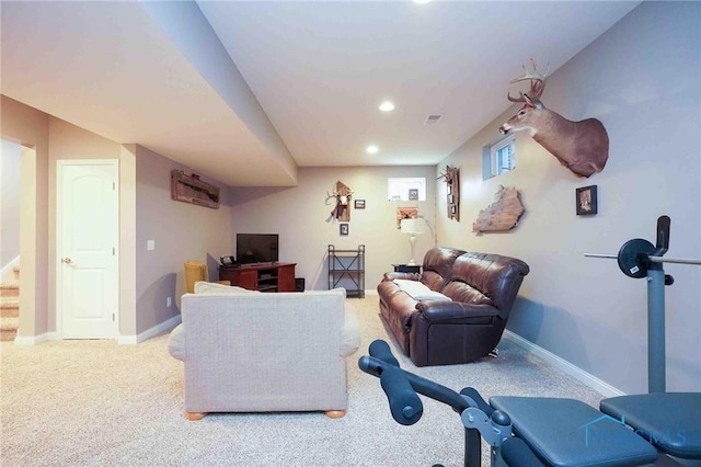 exercise room with carpet flooring, baseboards, and recessed lighting