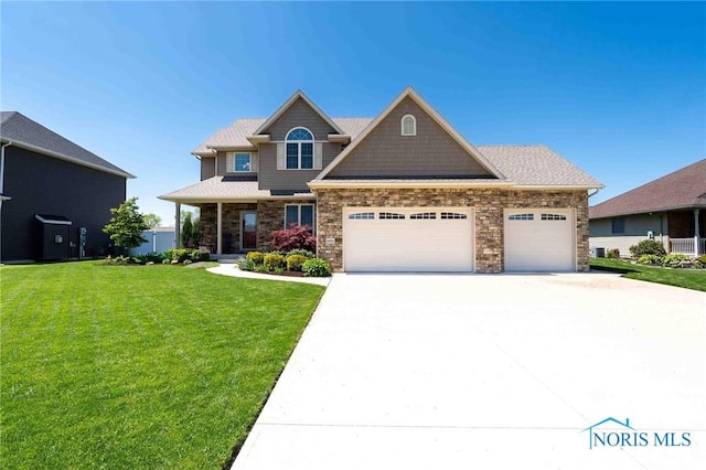 craftsman house with a garage, a front lawn, driveway, and stone siding