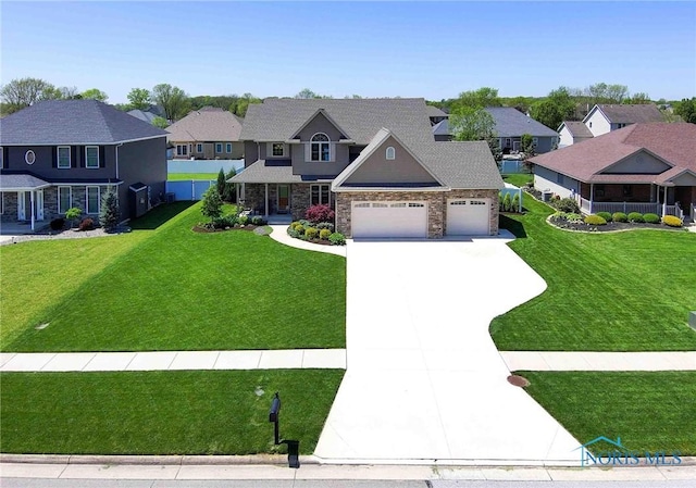 view of front of property with a residential view, stone siding, concrete driveway, a garage, and a front lawn