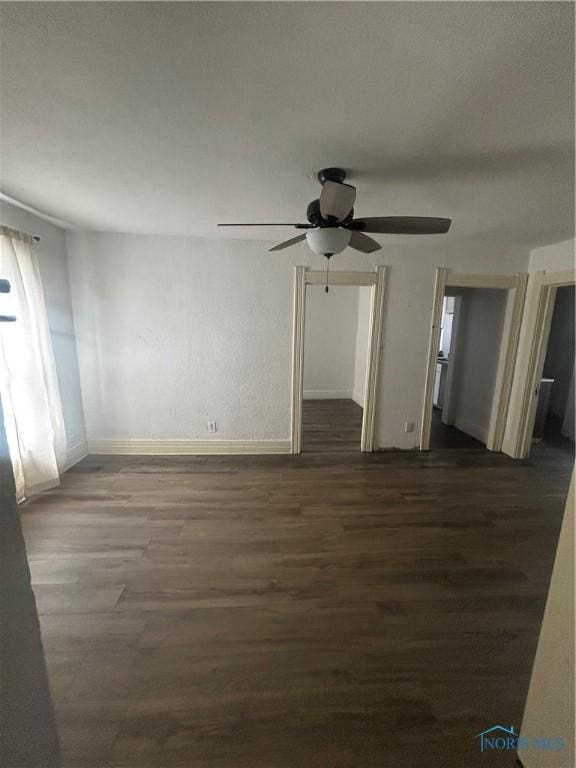 1566 Western Ave, Toledo, OH 43609 - unfurnished room featuring wood finished floors, ceiling fan, and baseboards