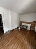 1566 Western Ave, Toledo, OH 43609 - unfurnished living room featuring wood finished floors