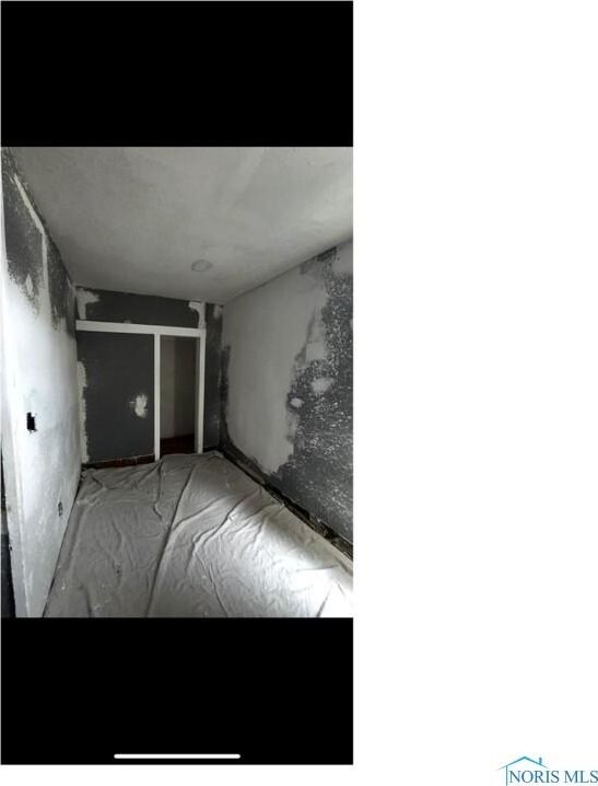 1566 Western Ave, Toledo, OH 43609 - unfurnished bedroom with a closet