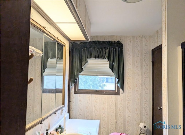 1270 S Park Ln, Wauseon, OH 43567 - bathroom featuring wallpapered walls and vanity