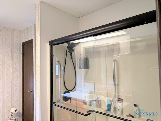 1270 S Park Ln, Wauseon, OH 43567 - bathroom with an enclosed shower and wallpapered walls