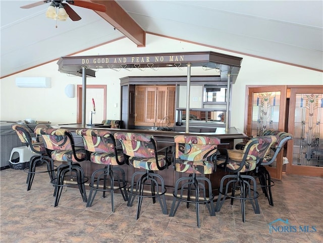 1270 S Park Ln, Wauseon, OH 43567 - bar featuring a wall mounted AC, ceiling fan, and stone finish flooring