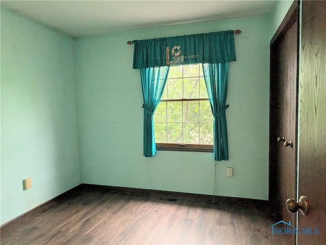 1270 S Park Ln, Wauseon, OH 43567 - empty room with wood finished floors