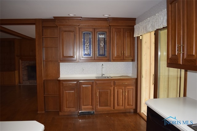 1527 S Ct, Findlay, OH 45840 - kitchen featuring light countertops, brown cabinets, dark wood-style floors, a sink, and recessed lighting