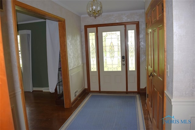1527 S Ct, Findlay, OH 45840 - entrance foyer with ornamental molding, wood finished floors, a chandelier, and wainscoting
