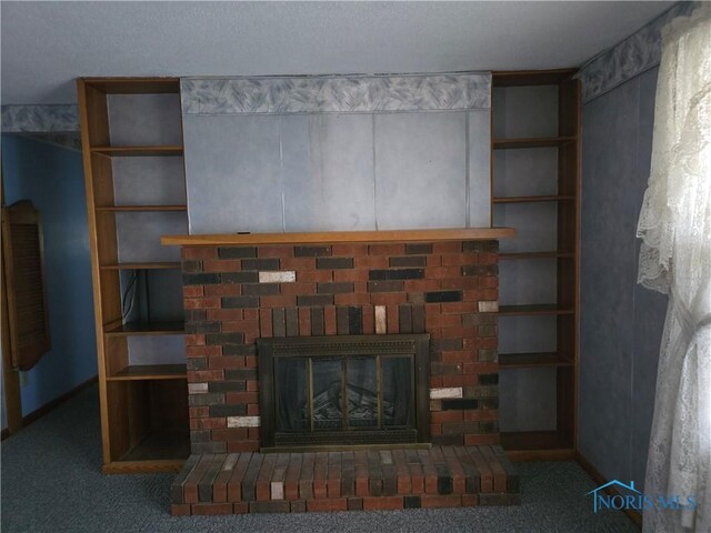 23423 Rd 104, Oakwood, OH 45873 - detailed view of a fireplace, carpet flooring, and baseboards