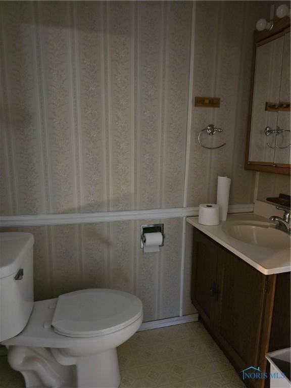 23423 Rd 104, Oakwood, OH 45873 - half bath featuring toilet and vanity
