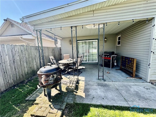 view of patio / terrace with fence