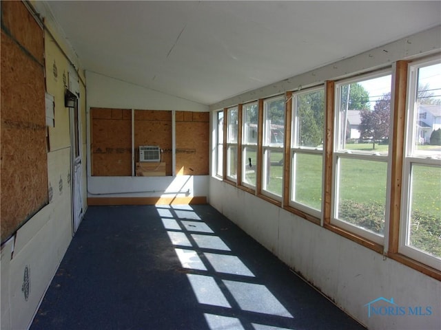 417 Race St, Clyde, OH 43410 - unfurnished sunroom featuring plenty of natural light, vaulted ceiling, and a wall mounted AC