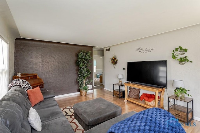 210 Willamont Rd, Toledo, OH 43612 - living room featuring wood finished floors and baseboards