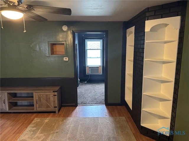 215 E Bryan St, Bryan, OH 43506 - corridor featuring wood finished floors and cooling unit