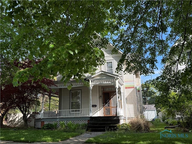 1023 Buckland Ave, Fremont, OH 43420 - victorian-style house featuring a porch
