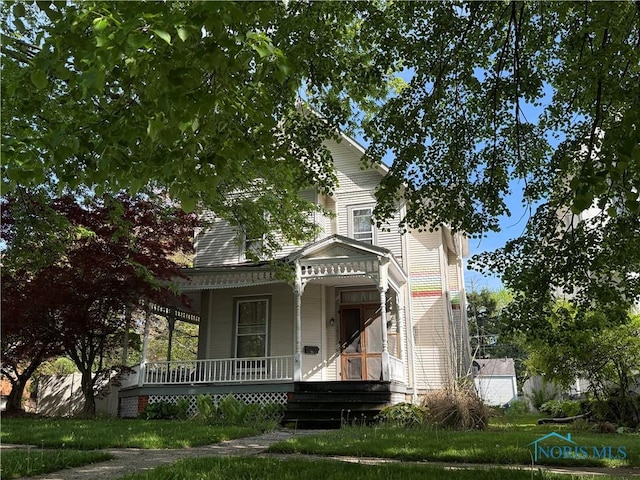 1023 Buckland Ave, Fremont, OH 43420 - victorian-style house featuring covered porch