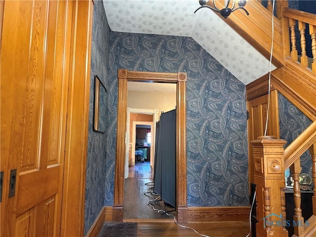 1023 Buckland Ave, Fremont, OH 43420 - corridor featuring wallpapered walls, baseboards, and wood finished floors
