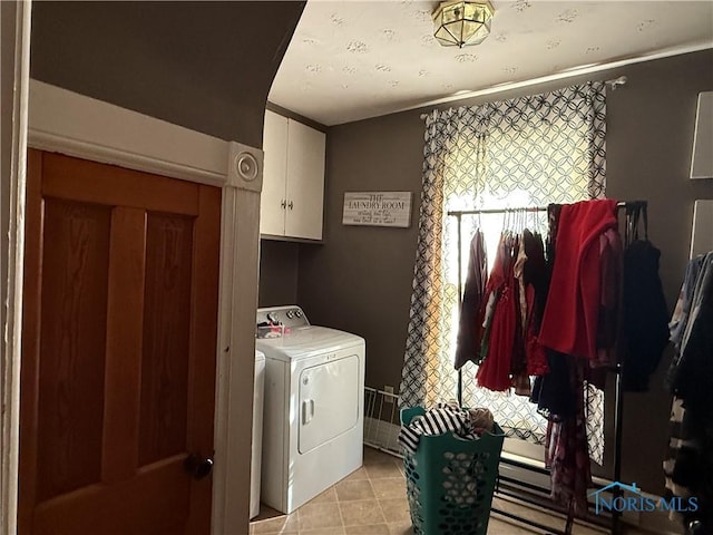 1023 Buckland Ave, Fremont, OH 43420 - laundry area featuring cabinet space and washing machine and clothes dryer