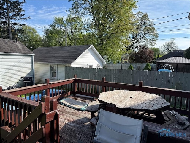 1023 Buckland Ave, Fremont, OH 43420 - wooden deck with fence and outdoor dining space