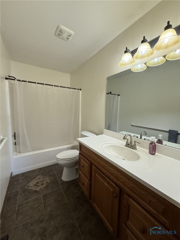 512 Fugate Dr, Defiance, OH 43512 - bathroom featuring toilet, tile patterned flooring, vanity, and shower / bath combo