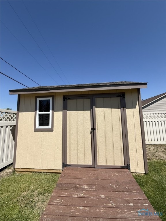 512 Fugate Dr, Defiance, OH 43512 - view of shed featuring fence