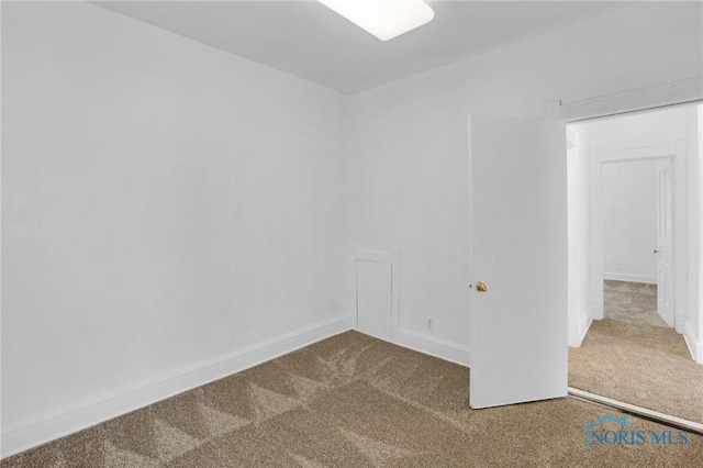 308 Crittenden Ave, Toledo, OH 43609 - carpeted spare room with baseboards