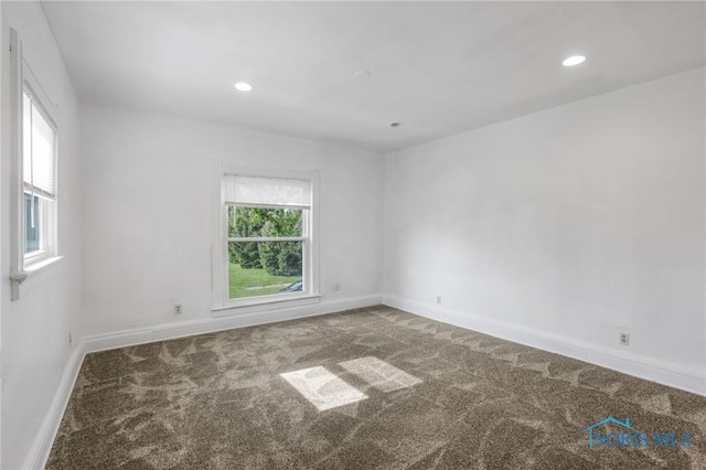308 Crittenden Ave, Toledo, OH 43609 - unfurnished room featuring carpet flooring, baseboards, and recessed lighting