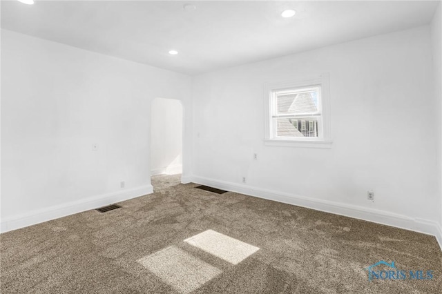 308 Crittenden Ave, Toledo, OH 43609 - carpeted spare room featuring baseboards and recessed lighting