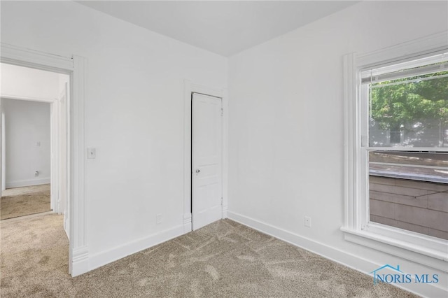 308 Crittenden Ave, Toledo, OH 43609 - carpeted empty room featuring baseboards