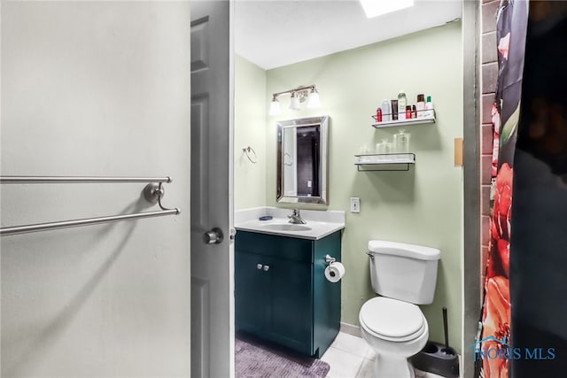 5956 E Pembridge Dr, Toledo, OH 43615 - bathroom featuring toilet, vanity, tile patterned floors, and curtained shower