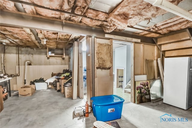 5956 E Pembridge Dr, Toledo, OH 43615 - unfinished basement featuring freestanding refrigerator