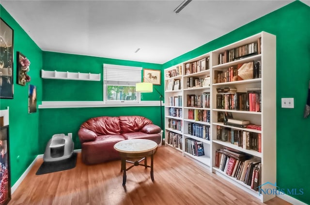 5956 E Pembridge Dr, Toledo, OH 43615 - living area with wood finished floors and baseboards