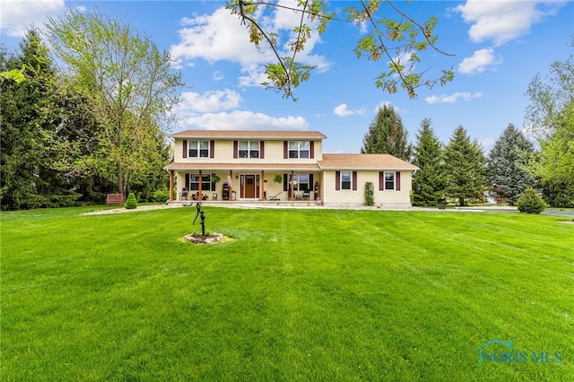 8012 County Highway 55, Upper Sandusky, OH 43351 - view of front of house featuring a porch and a front yard