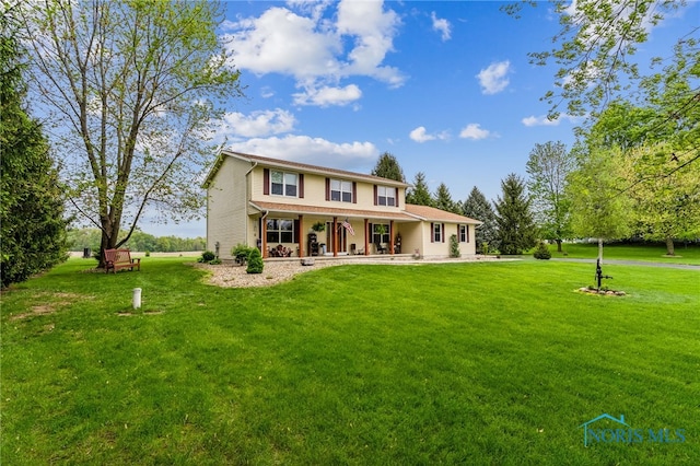 8012 County Highway 55, Upper Sandusky, OH 43351 - view of front of home featuring a front lawn and covered porch
