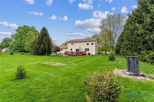 8012 County Highway 55, Upper Sandusky, OH 43351 - back of property featuring a yard and a deck