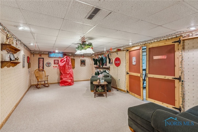 8012 County Highway 55, Upper Sandusky, OH 43351 - finished basement featuring wallpapered walls, carpet, a drop ceiling, and baseboards