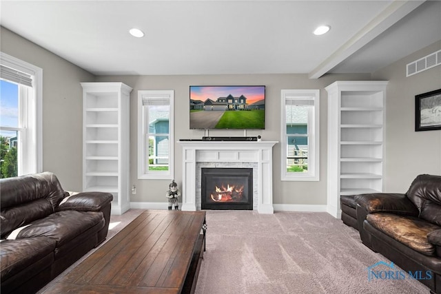 9575 Newbury Ln, Whitehouse, OH 43571 - living room with carpet flooring, a glass covered fireplace, baseboards, and recessed lighting