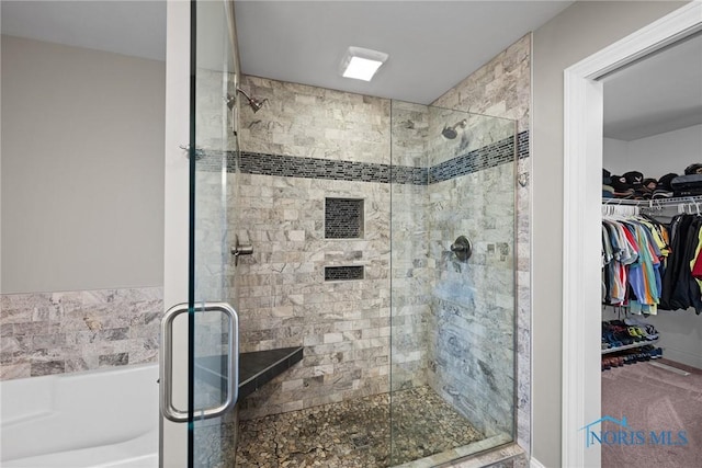 9575 Newbury Ln, Whitehouse, OH 43571 - full bath with a stall shower, a spacious closet, and a bath