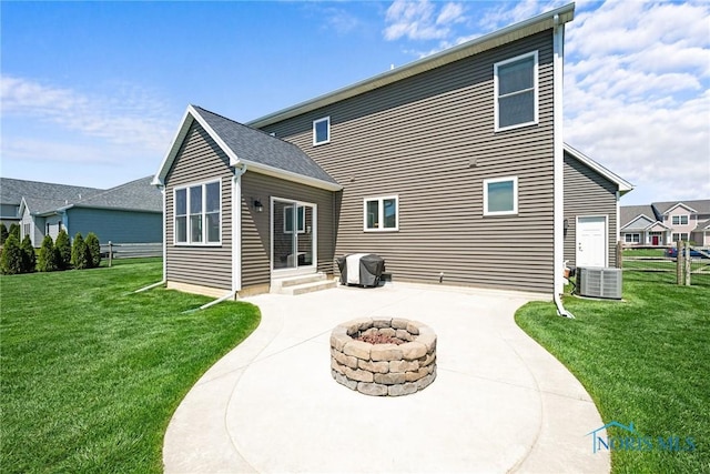 9575 Newbury Ln, Whitehouse, OH 43571 - back of house featuring an outdoor fire pit, a patio, a yard, and central AC unit