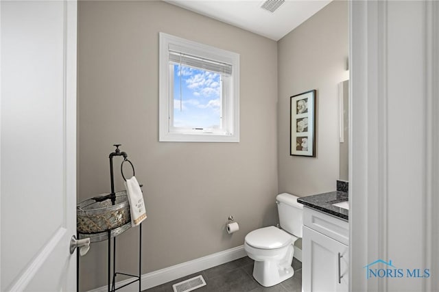9575 Newbury Ln, Whitehouse, OH 43571 - bathroom with tile patterned flooring, toilet, vanity, and baseboards