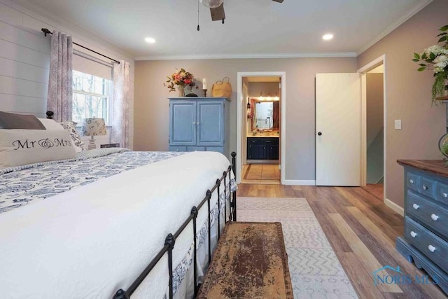 2057 Windsor Pl, Findlay, OH 45840 - bedroom featuring light wood finished floors, ornamental molding, baseboards, recessed lighting, and connected bathroom