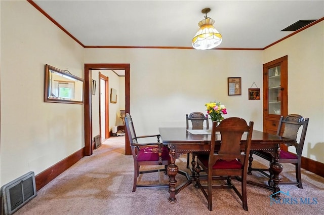 7438 Yawberg Rd, Whitehouse, OH 43571 - dining room with crown molding, carpet, and baseboards