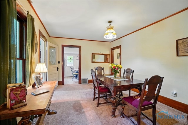 7438 Yawberg Rd, Whitehouse, OH 43571 - dining room with ornamental molding, baseboards, and carpet floors