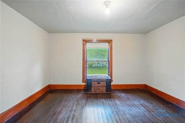 7438 Yawberg Rd, Whitehouse, OH 43571 - empty room with hardwood / wood-style floors and baseboards