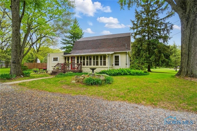 7438 Yawberg Rd, Whitehouse, OH 43571 - colonial inspired home with a wooden deck and a shingled roof