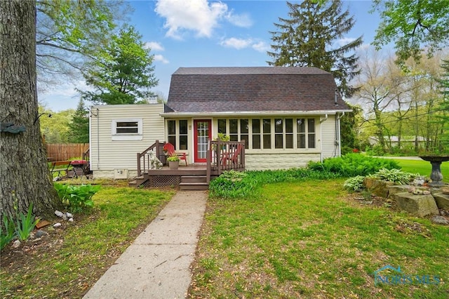 7438 Yawberg Rd, Whitehouse, OH 43571 - dutch colonial featuring a wooden deck, a shingled roof, and stone siding
