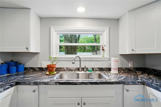 7438 Yawberg Rd, Whitehouse, OH 43571 - kitchen featuring a sink, white cabinets, and recessed lighting